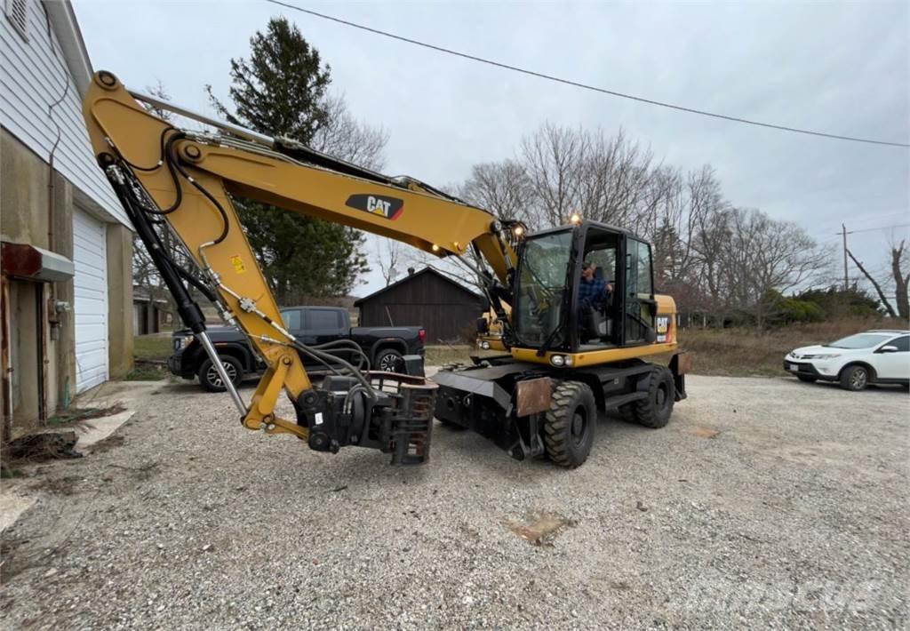 CAT M313D Gumikerekes kotrók