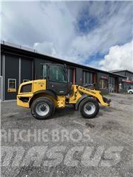 New Holland W70C Gumikerekes homlokrakodók