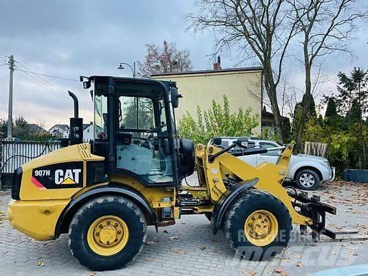 CAT 907H Gumikerekes homlokrakodók