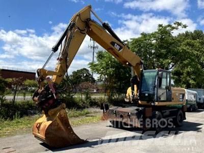 CAT M322D Gumikerekes kotrók