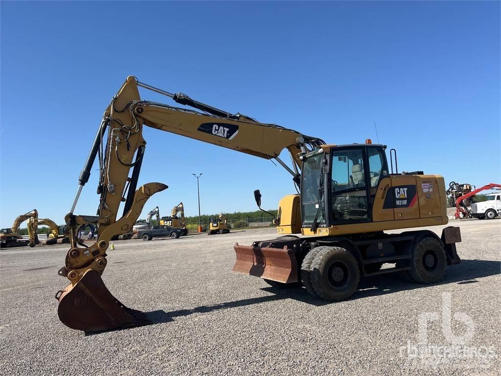 CAT M318F Gumikerekes kotrók