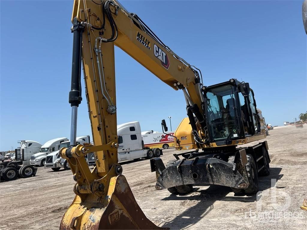 CAT M320 Gumikerekes kotrók