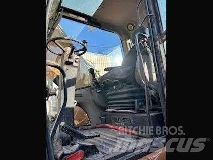 CASE WX210 Gumikerekes kotrók