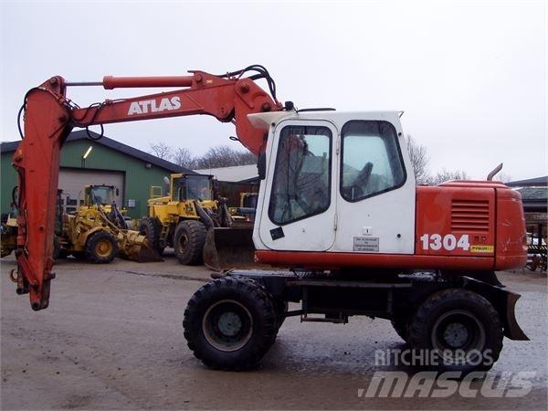 Atlas 1304M Gumikerekes kotrók