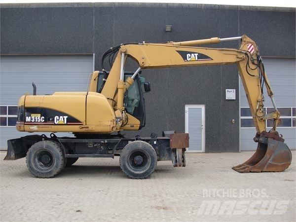 CAT M315C Gumikerekes kotrók