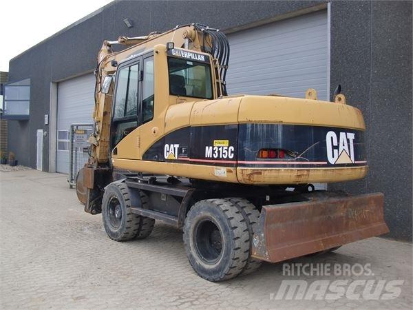 CAT M315C Gumikerekes kotrók