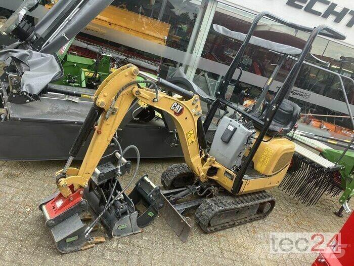 CAT 300.09D Gumikerekes kotrók