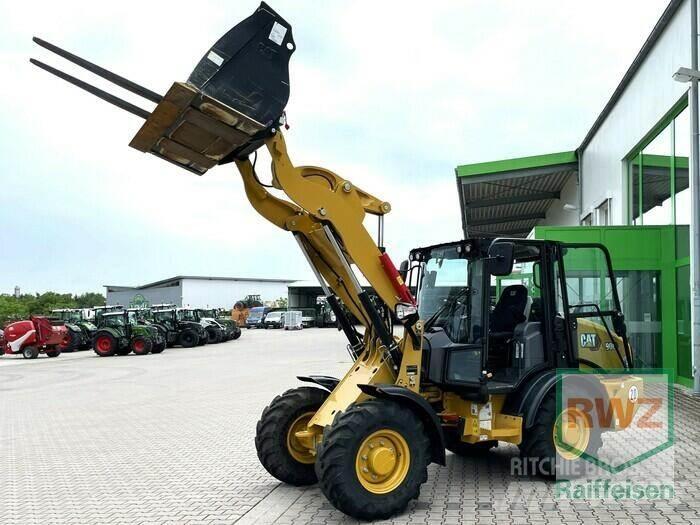 CAT 906 Radlader Gumikerekes homlokrakodók