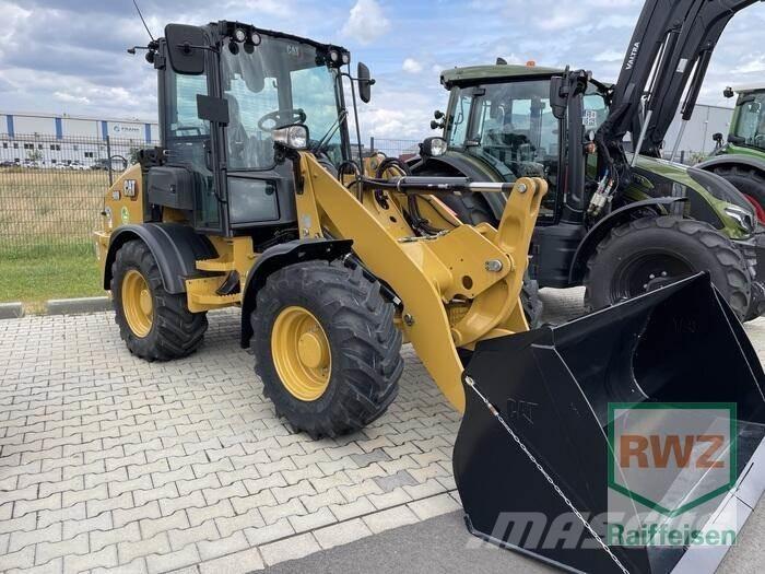 CAT 908 Radlader Gumikerekes homlokrakodók