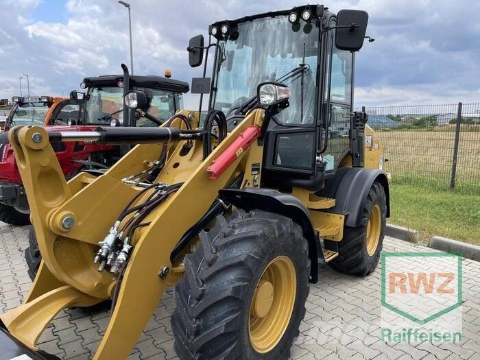 CAT 908 Radlader Gumikerekes homlokrakodók
