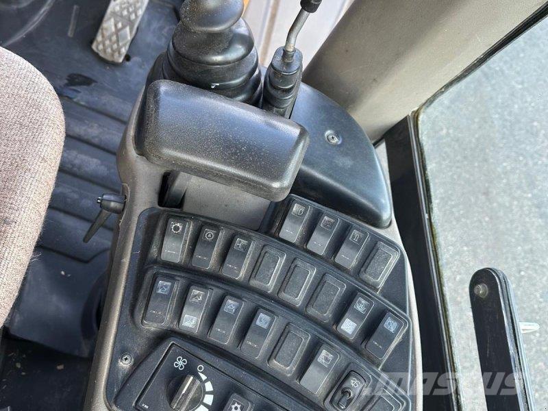 CASE 721 E Gumikerekes homlokrakodók