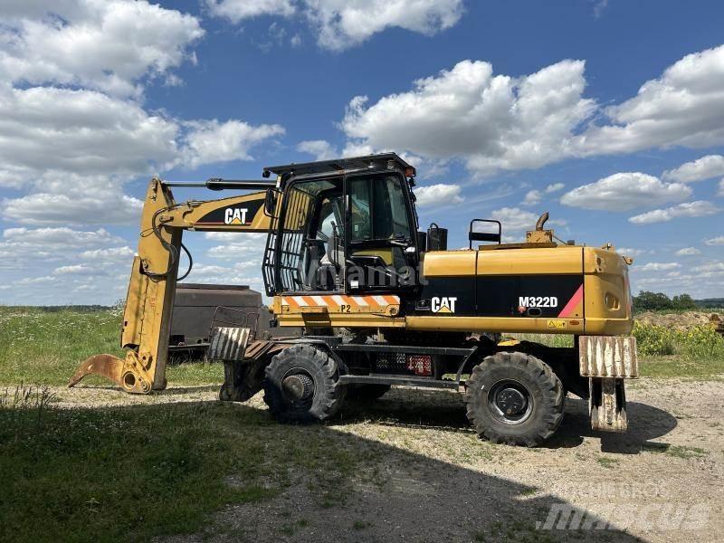 CAT M322D VAH Gumikerekes kotrók