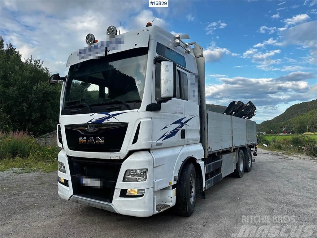 MAN TGX 26.560 Flatbed truck with Hiab 138 crane from  Platós / Ponyvás teherautók