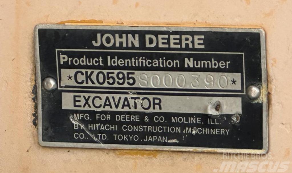 John Deere 595 Gumikerekes kotrók