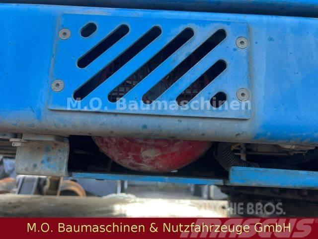 Fuchs MHL 331 / ZSA / AC / Hochfahrbare Kabine /Magnet Gumikerekes kotrók