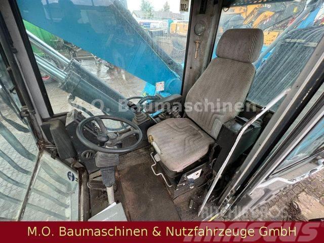 Fuchs MHL 331 / ZSA / AC / Hochfahrbare Kabine / Gumikerekes kotrók
