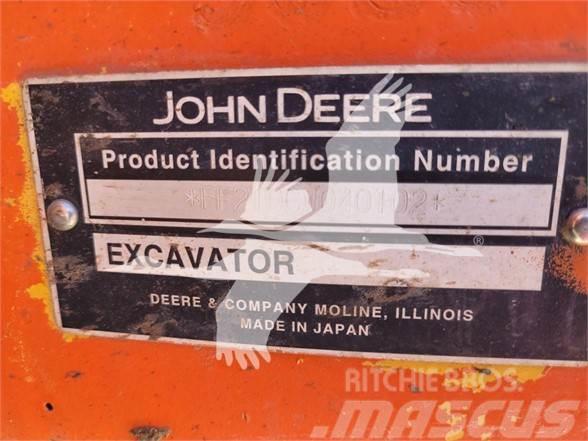 John Deere 210C W Gumikerekes kotrók